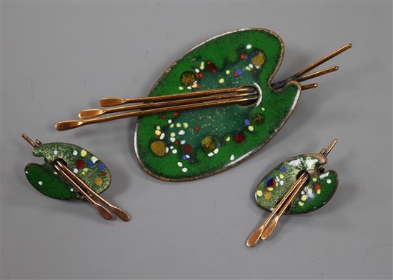 A Matisse base metal and coloured enamel palette and brush brooch and a pair of earrings.